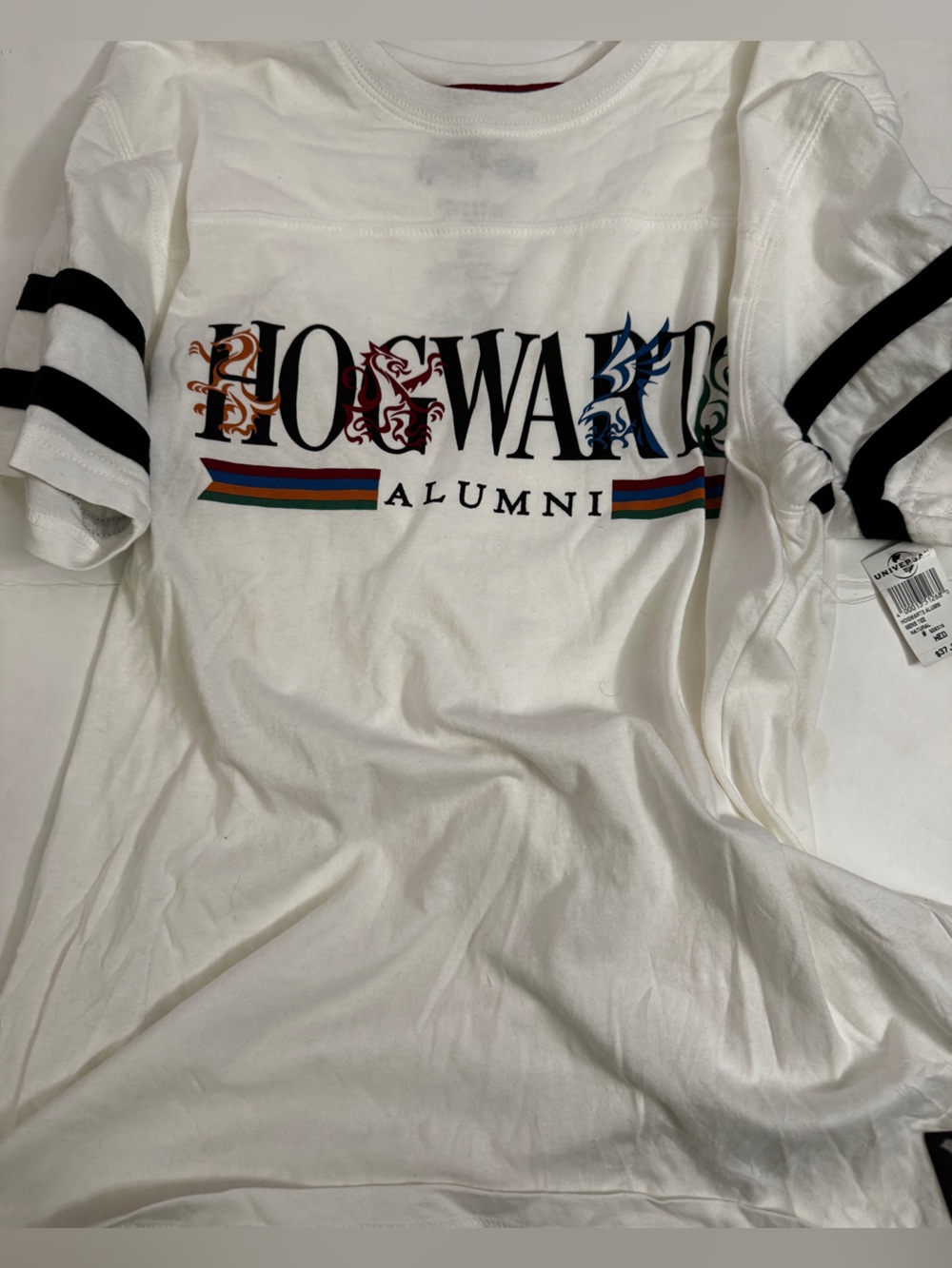 Universal White Hogwarts Alumni Graphic with Multicolor Crest